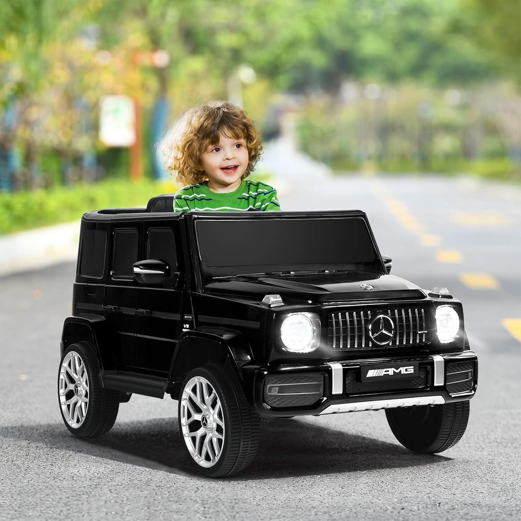 INFANS Licensed Mercedes Benz G63 Kids Ride On Car, 12V Electric Vehicle with Remote Control, Double Open Doors, Music, Bluetooth, Wheels Suspension, Battery Powered for Children Boy Girl (Black)