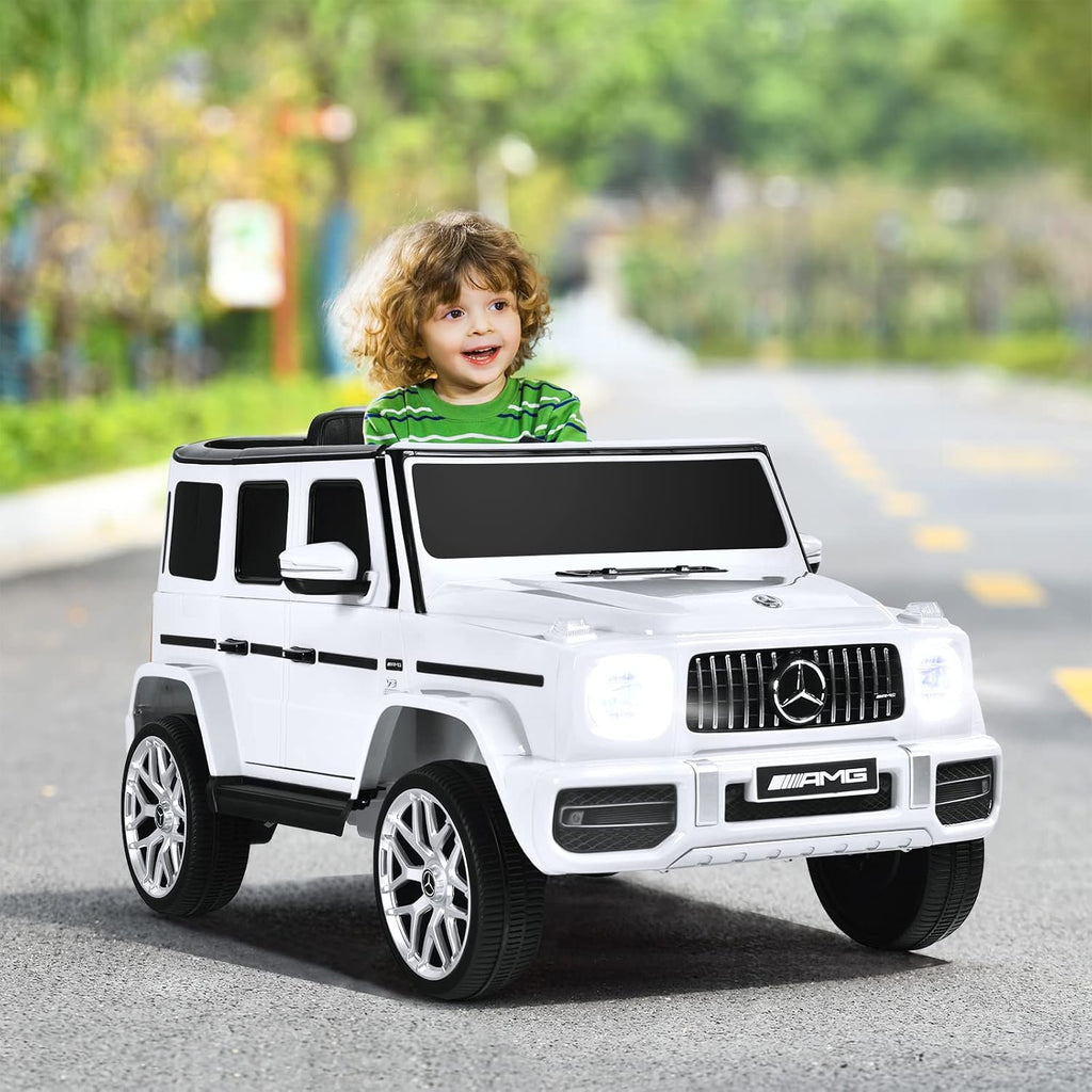 INFANS Licensed Mercedes Benz G63 Kids Ride On Car, 12V Electric Vehicle with Remote Control, Double Open Doors, Music, Bluetooth, Wheels Suspension, Battery Powered for Children Boy Girl (White)