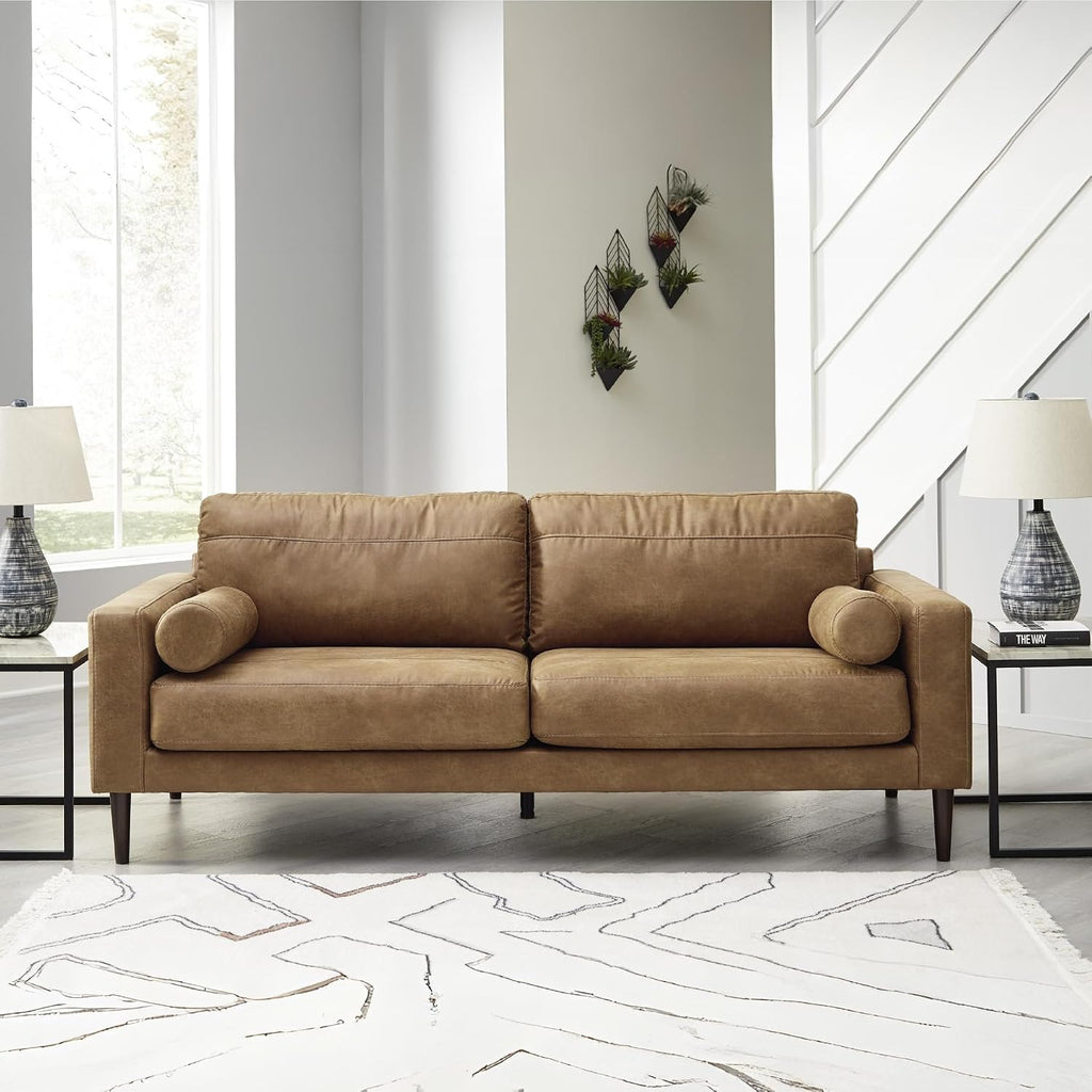 Signature Design by Ashley Telora Faux Leather Sofa, 2 Bolster Pillows, Loose Cushions, Faux Wood Finish Accent Legs, 85' W x 35' D x 35' H, Dark Brown