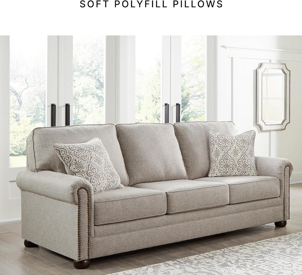 Signature Design by Ashley Gaelon Transitional Sofa with Nailheads and 2 Accent Pillows, Beige