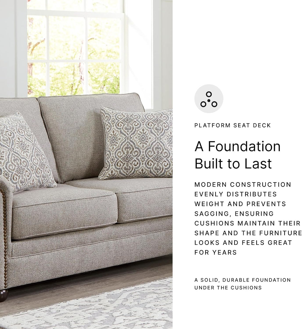 Signature Design by Ashley Gaelon Transitional Loveseat with Nailheads and 2 Accent Pillows, Beige