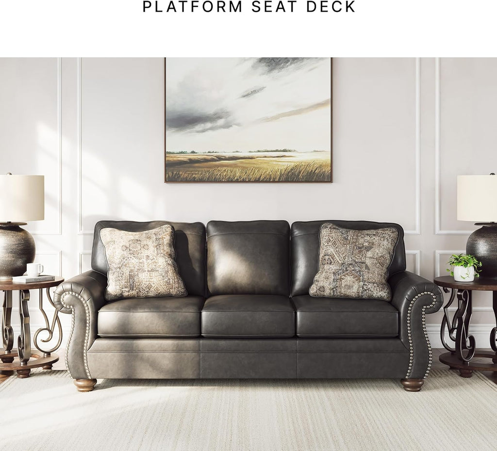 Signature Design by Ashley Shadsburne Rustic Faux Leather Sofa with Nailhead Trim and 2 Chenille Throw Pillows, Pillows with Soft Polyfill, Reinforced Frame for Added Stability, Black