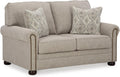Signature Design by Ashley Gaelon Transitional Loveseat with Nailheads and 2 Accent Pillows, Beige