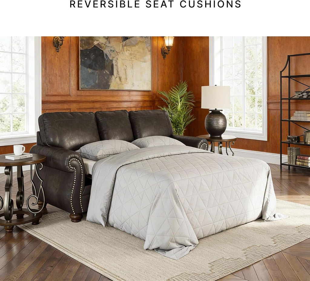 Signature Design by Ashley Chatterton Rustic Faux Leather Queen Sofa Sleeper with Bi-Fold Memory Foam Mattress, Nailhead Trim and 2 Throw Pillows, Queen, Black