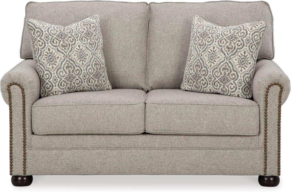 Signature Design by Ashley Gaelon Transitional Loveseat with Nailheads and 2 Accent Pillows, Beige