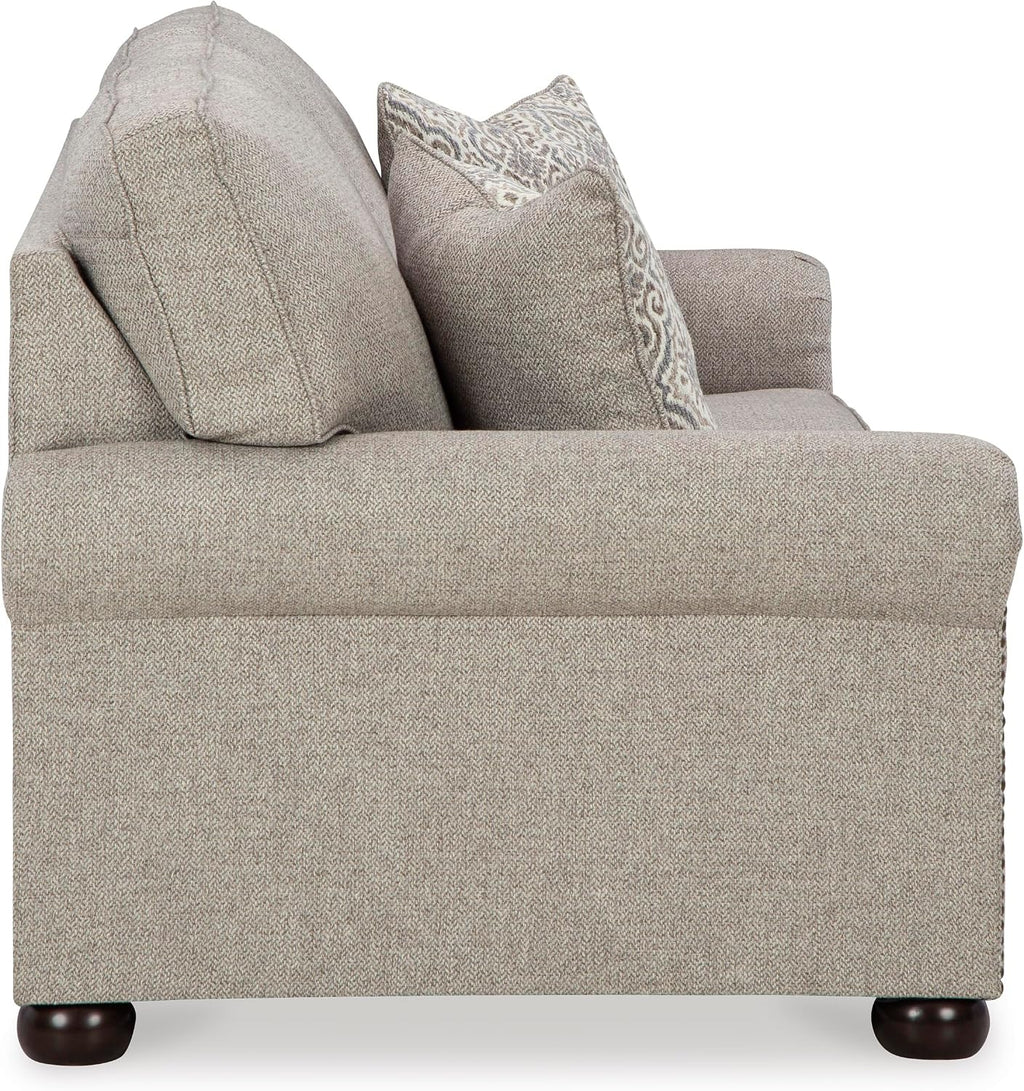 Signature Design by Ashley Gaelon Transitional Sofa with Nailheads and 2 Accent Pillows, Beige